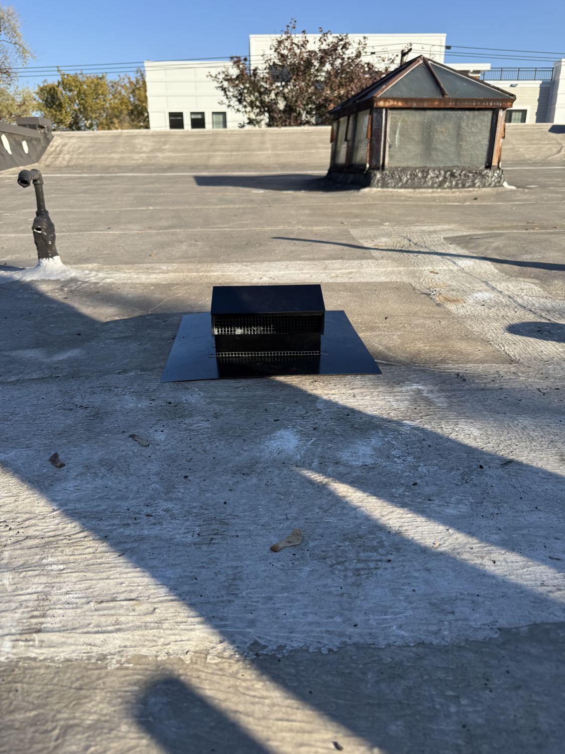 New roof vent termination installed on the roof for the bathroom exhaust fan — Ho-Ho-Kus, NJ