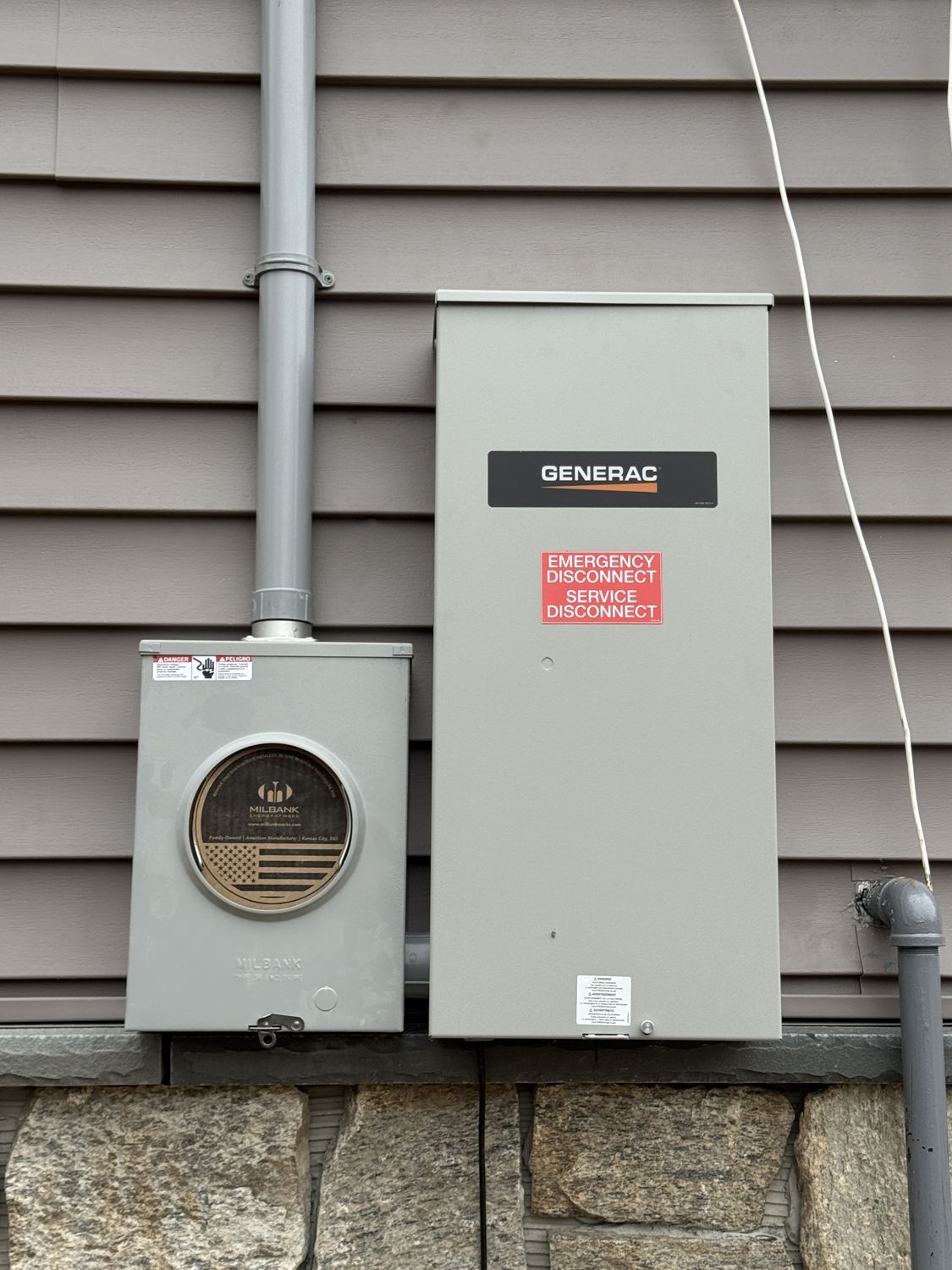New meter and Generac automatic transfer switch installed by Fuse Electric as the service disconnect on a North Haledon, NJ home