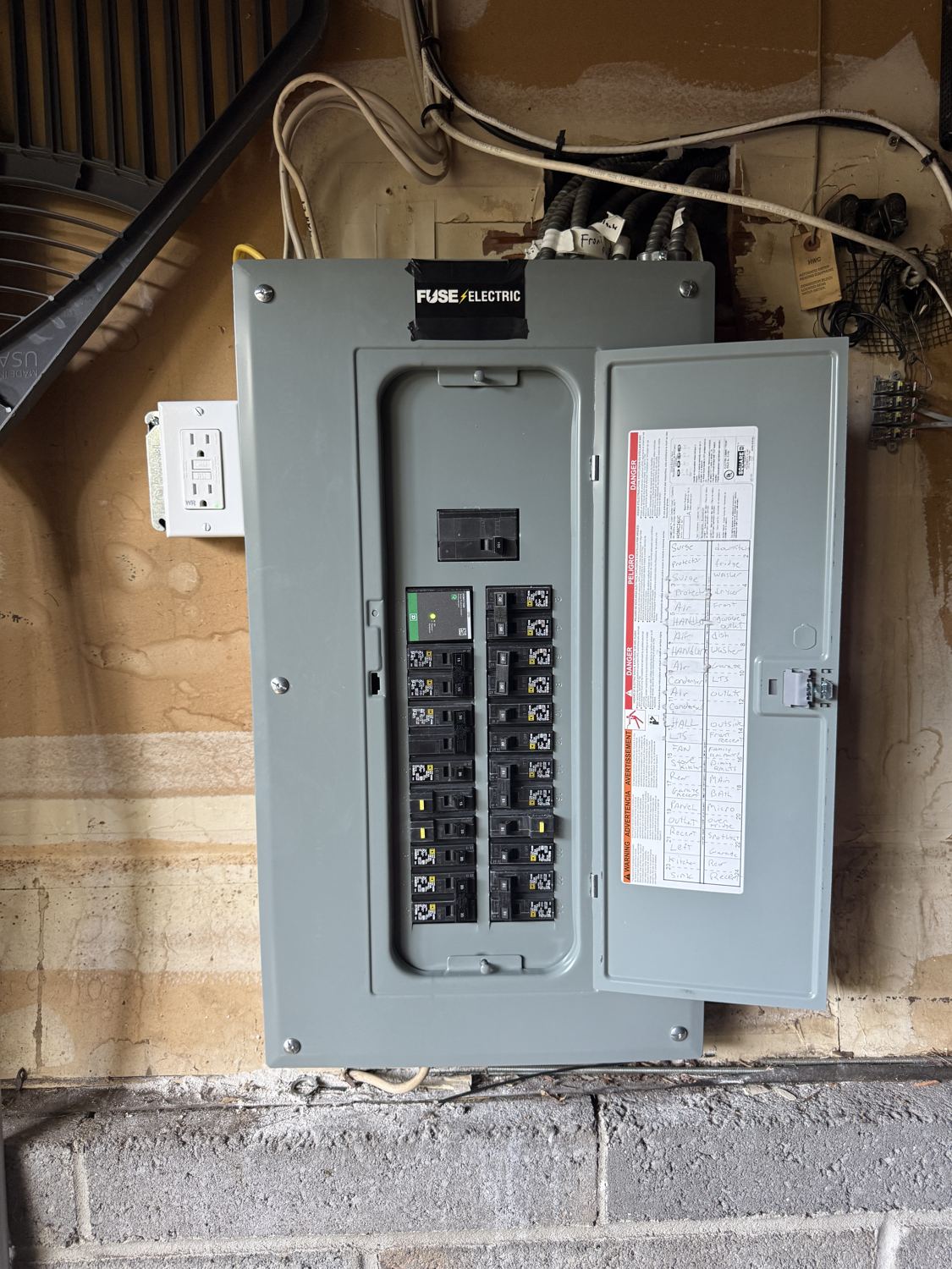 After: new labeled Square D panel installed by Fuse Electric in Tenafly, NJ