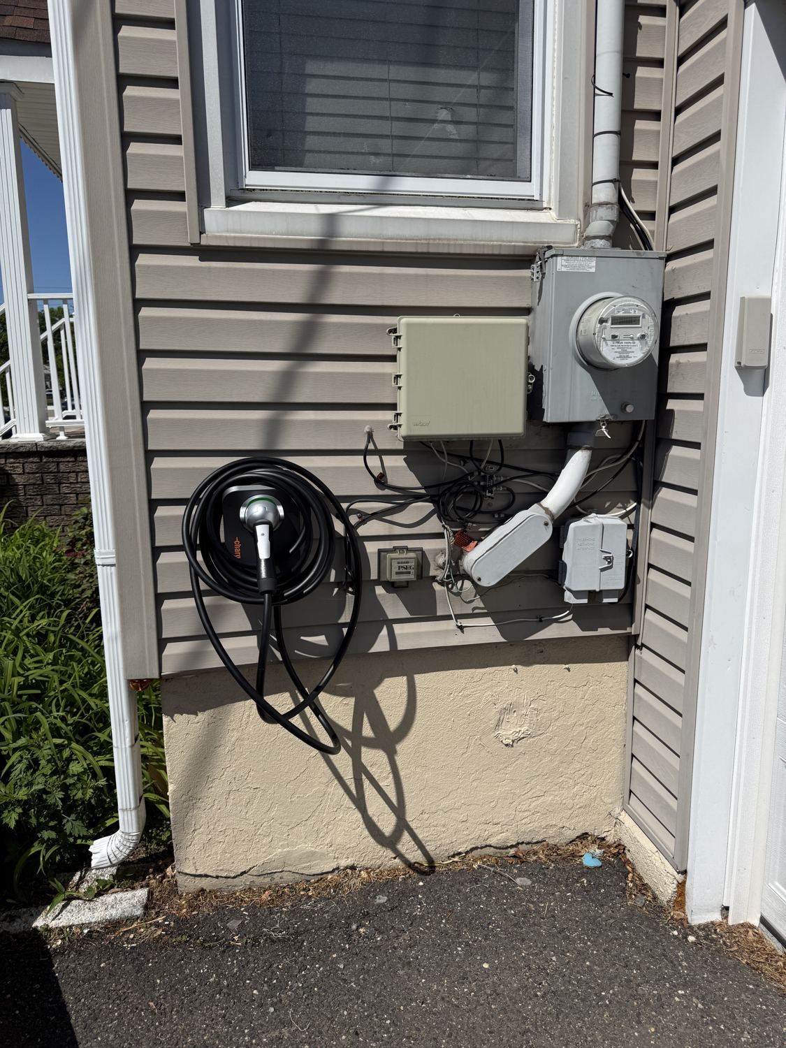Finished Level 2 EV charger beside the service in Paramus, NJ by Fuse Electric