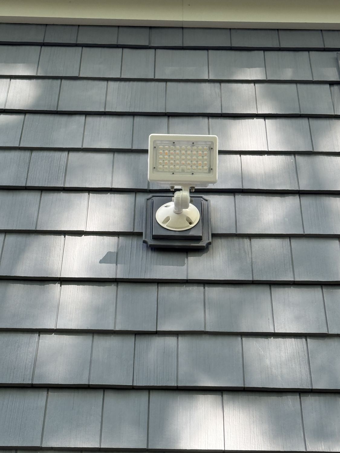 Finished exterior LED floodlight installed by Fuse Electric on an Upper Saddle River, NJ home