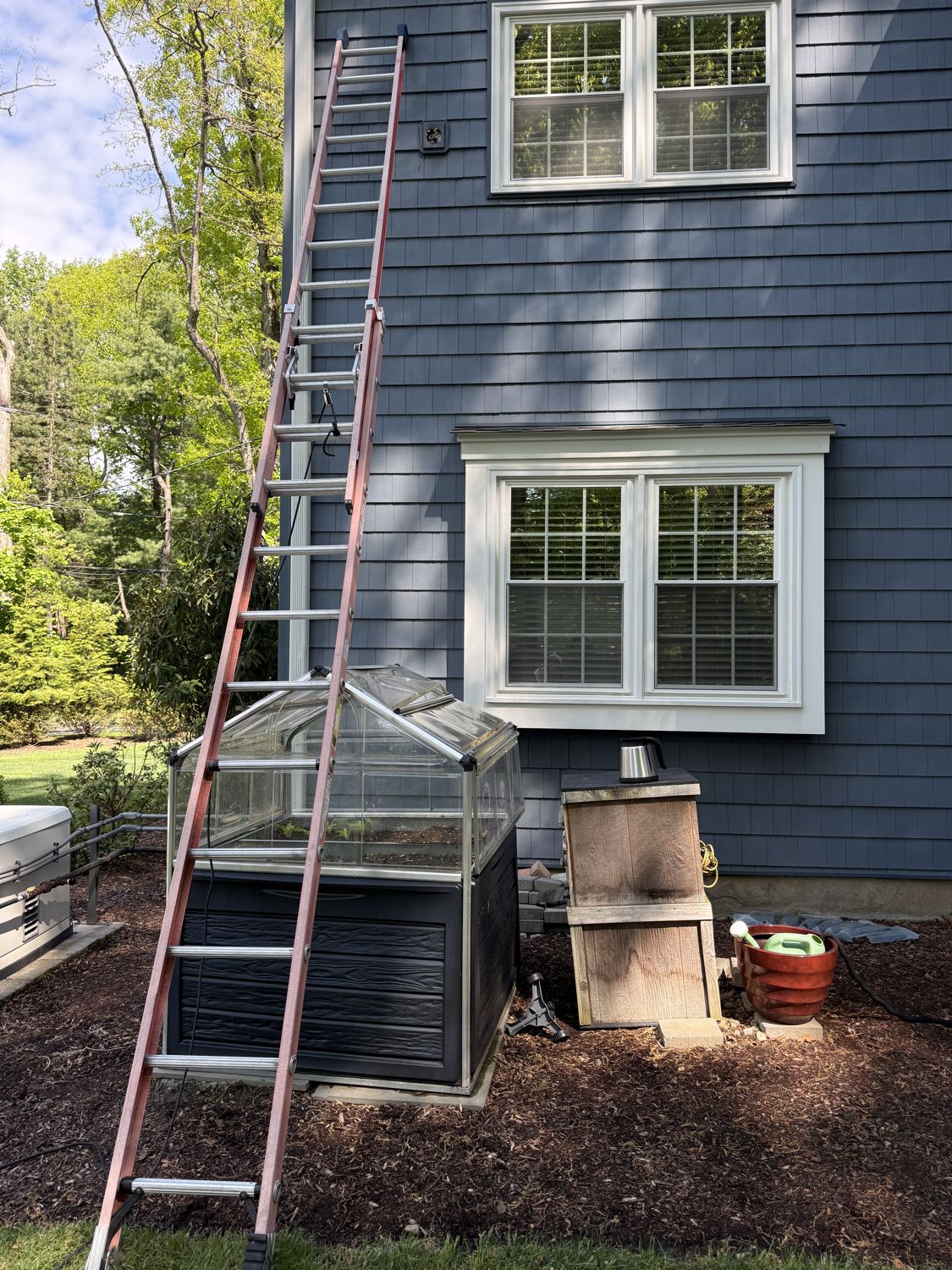Exterior LED floodlight installation in progress on an Upper Saddle River, NJ home by Fuse Electric