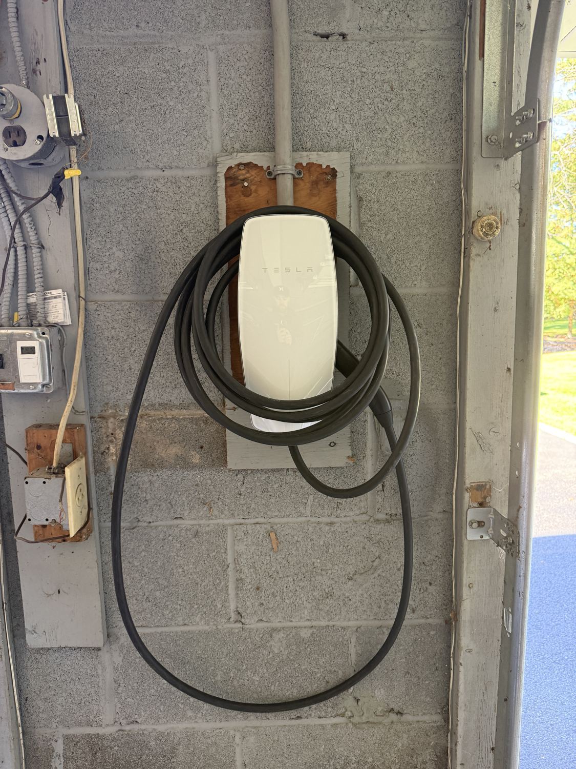 Finished garage Level 2 EV charger in Upper Saddle River, NJ by Fuse Electric